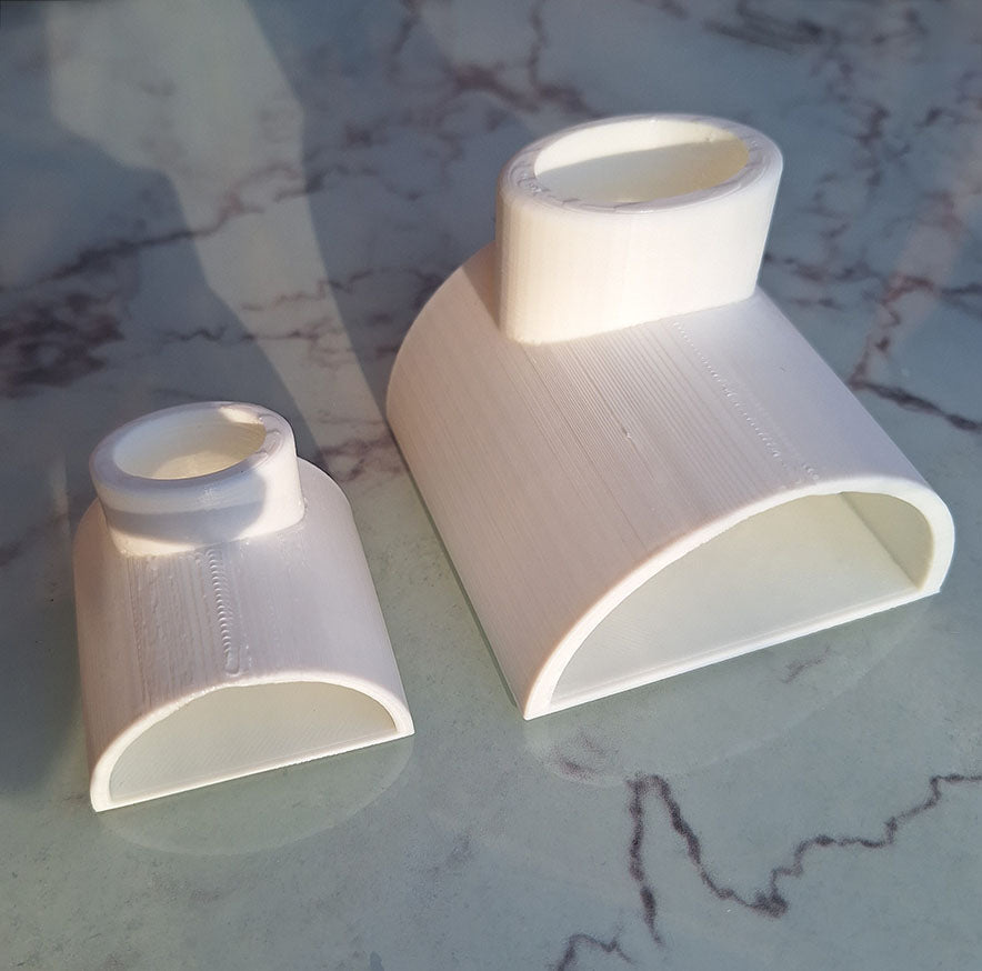 White PLA 'The Cave' in Large and Mini sizes, sleek aquarium accessories for enhancing tank environments with a clean, modern look.