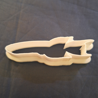 Aphyosemion striatum (Red Striped Killifish)  fish-shaped clay/cookie cutter in Creality White PLA, food-safe, on a contrasting black background.